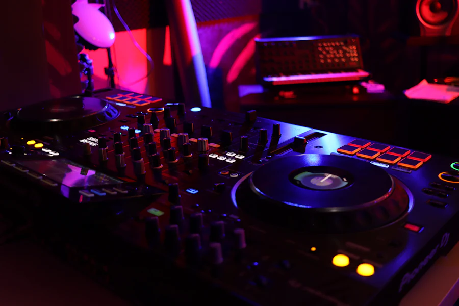 A DJ controller in pink light