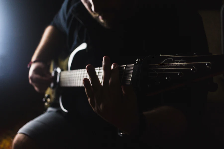 A guitarist's hands, close up